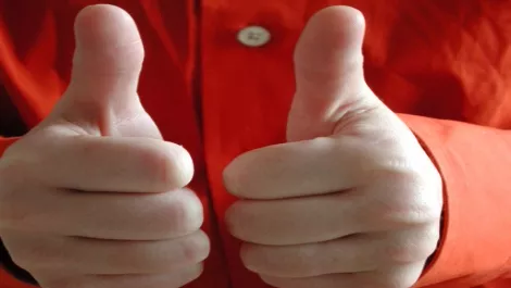 Thumbs up two